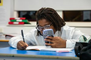 A young school student doing homework